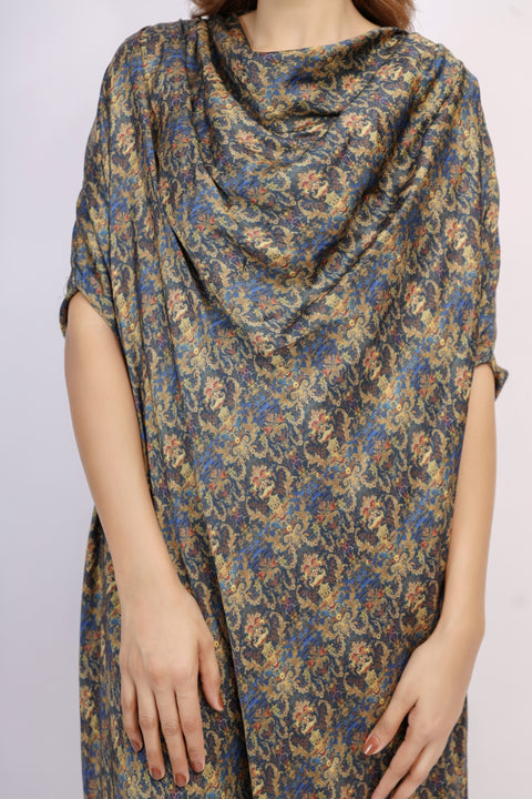Floral patterned dress with a draped design on a plain background — alternate view
