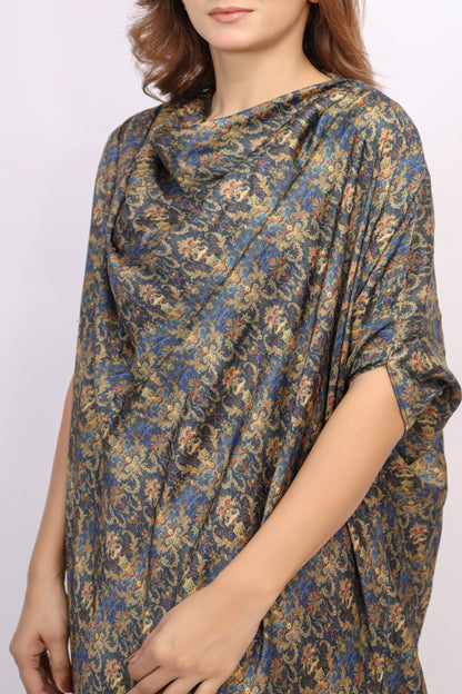 Woman wearing a floral patterned dress on a white background