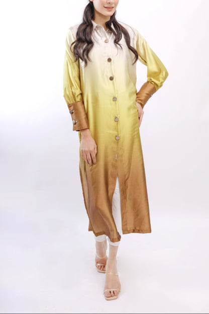 Woman wearing a yellow and brown outfit on a white background