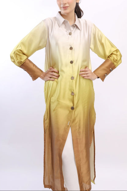 Woman wearing a yellow outfit with a white background
