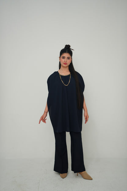 Cape with chain detail